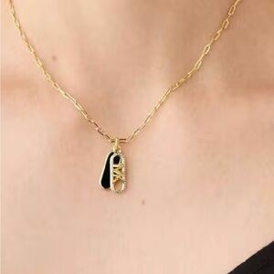 Michael Kors Gold-Tone Chain Necklace with Black & Gold Sneaker Charm
